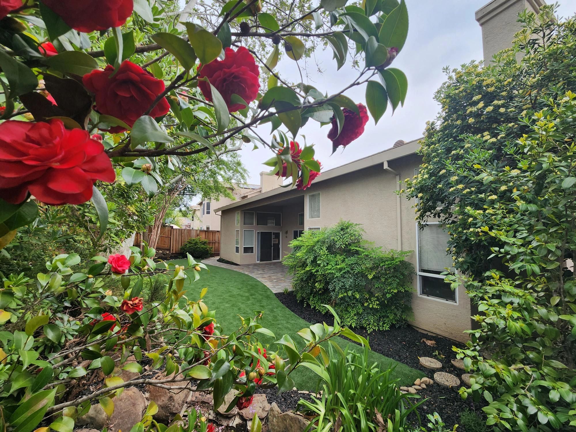 Reliable Landscaping backyard project with turf and hardscape