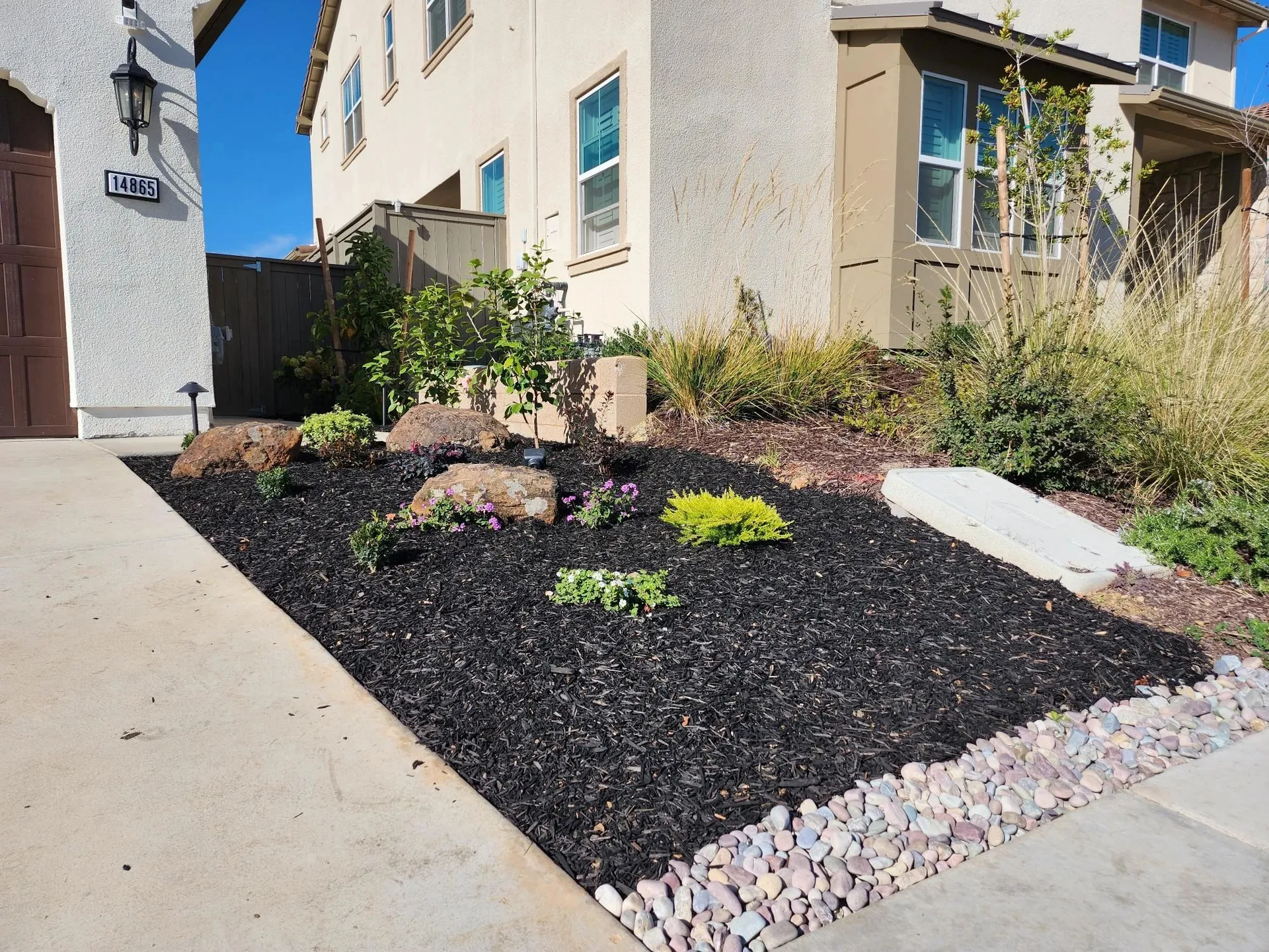 Backyard remodel with finished hardscape photo 1